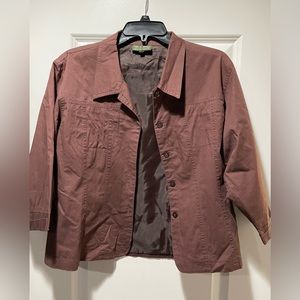 Beautiful woman’s brown shirt or light jacket